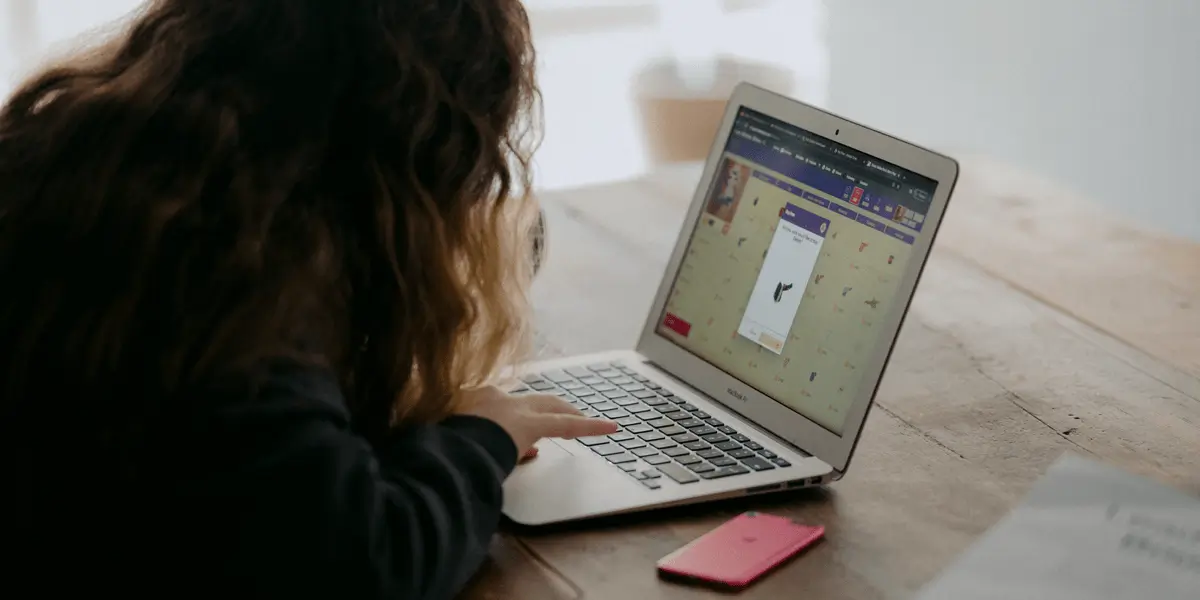 ui courses 2020 cover image Aspiring UI designer researching the best online UI design courses on a laptop